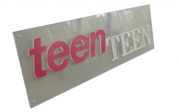 Acrylic 3D lettering mounted on acrylic business sign