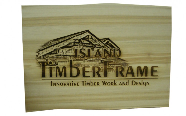 Laser etched graphics on fir wood business sign