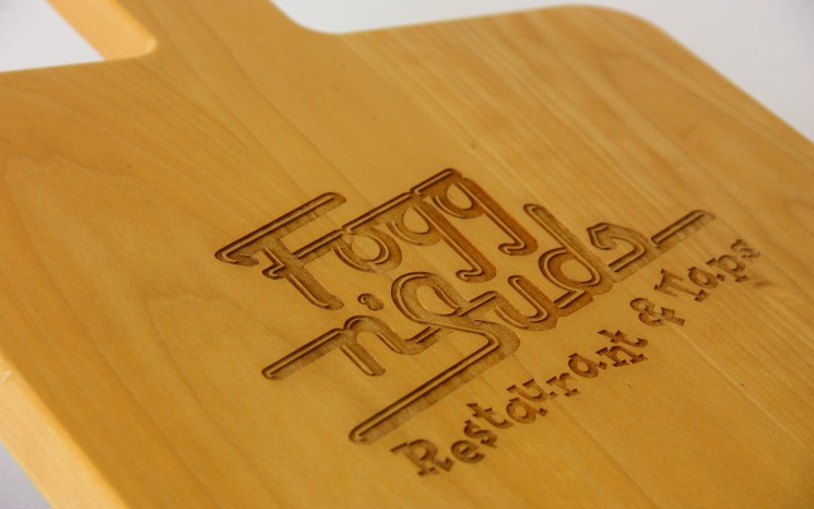 Custom made maple wood serving board with laser engraved logo