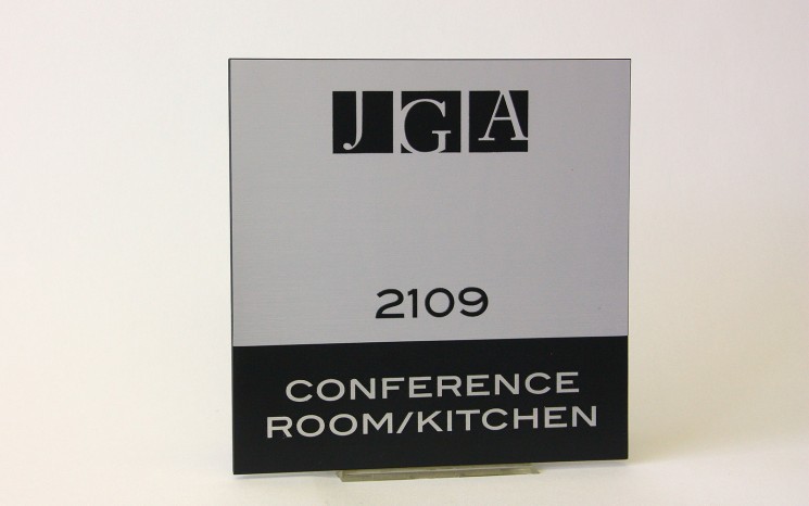 Raised lettering brushed aluminum wayfinder/directional sign