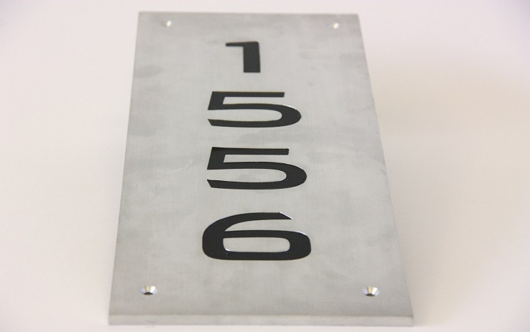 Engraved hand brushed satin aluminum wayfinder/directional sign