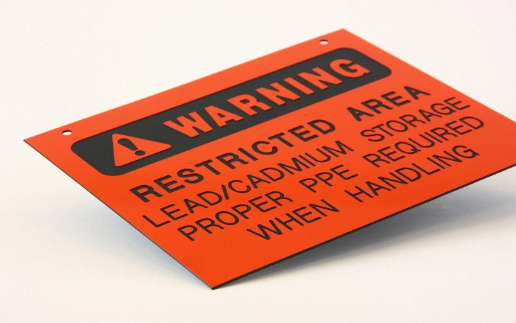 Laser engraved plastic warning directional sign