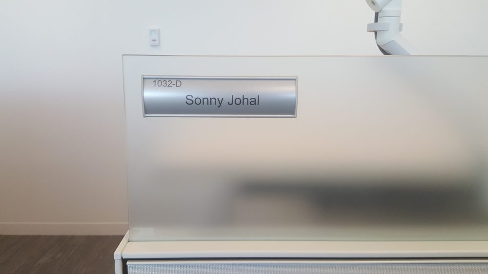 Changeable VSC60-8.5L Office Nameplate Sign with changeable insert installed on workstation A