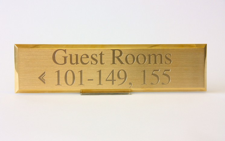 Engraved brush faced brass wayfinder/directional sign