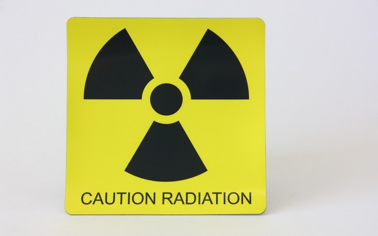 Laser engraved plastic caution sign
