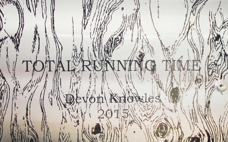 Laser etched graphics on stainless steel cabinet