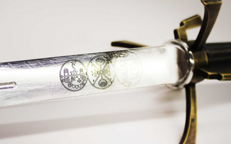Laser etching on sword blade
