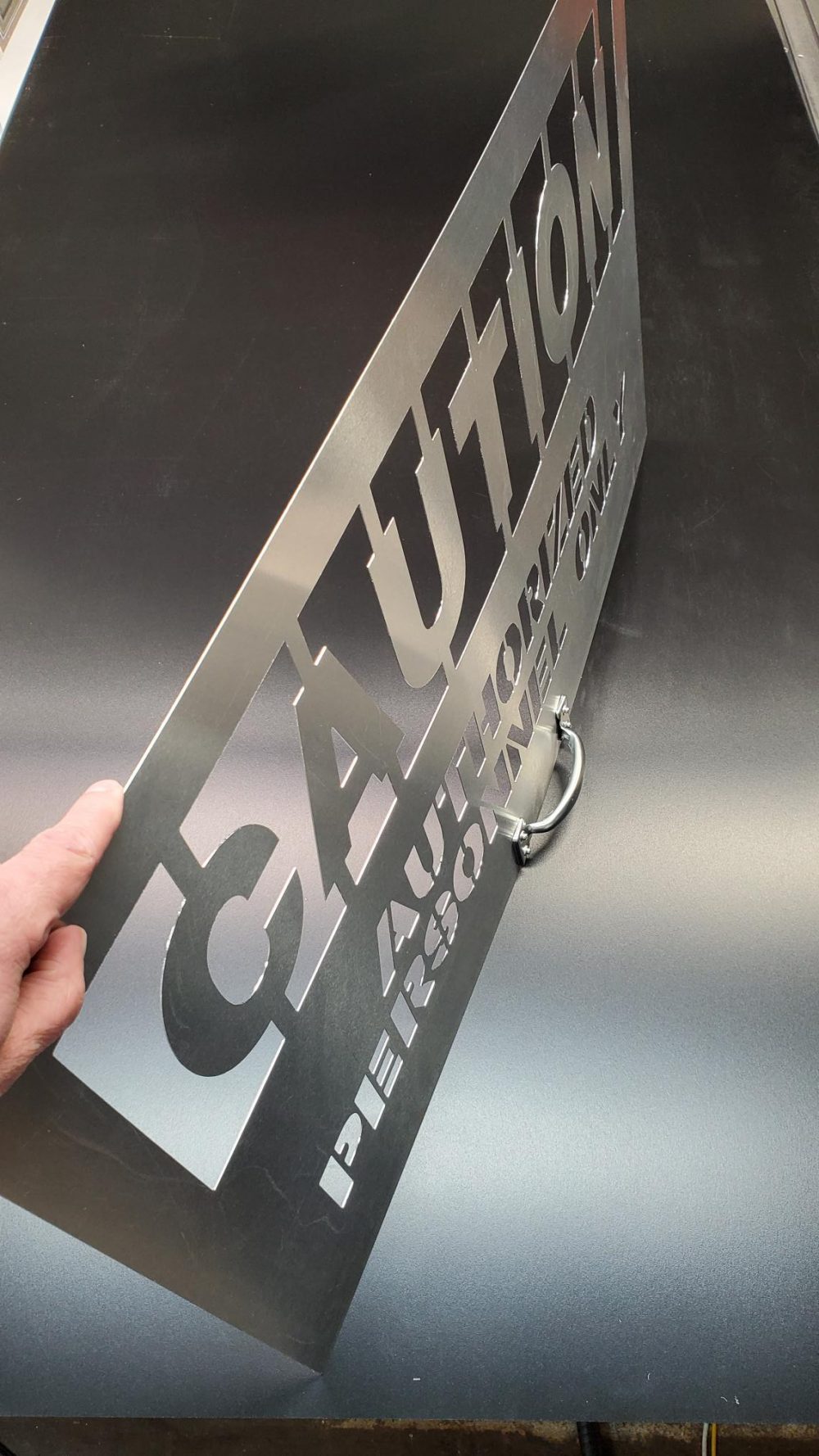 Custom Caution aluminum stencil with handle - side