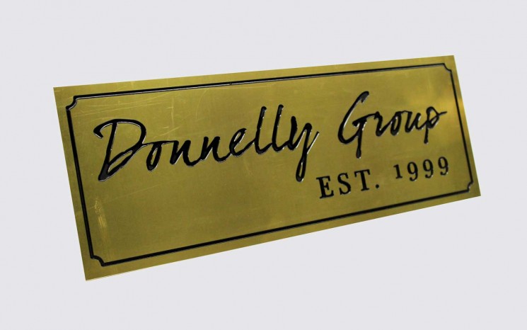 Door plaque engraved wtih infilled gloss black