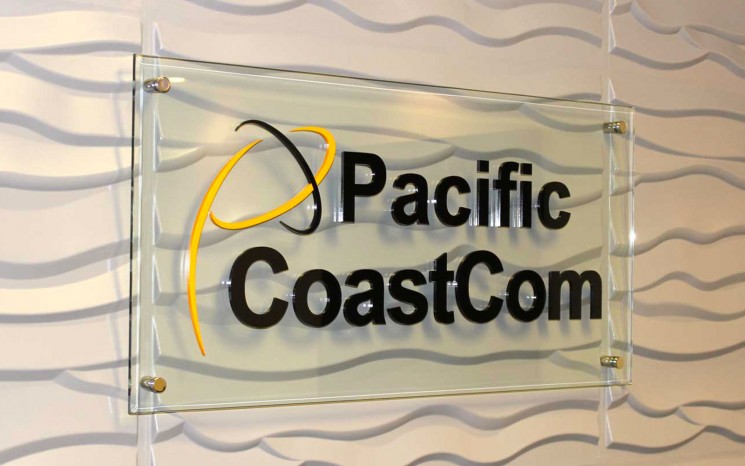 Area reception sign on glass panel