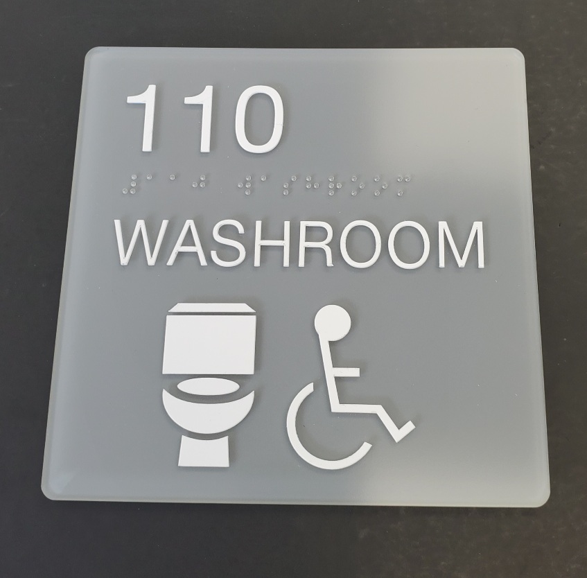 Custom Schoolfit Sign 8 x 8 washroom with raised tactile ADA and clear braille Toilet